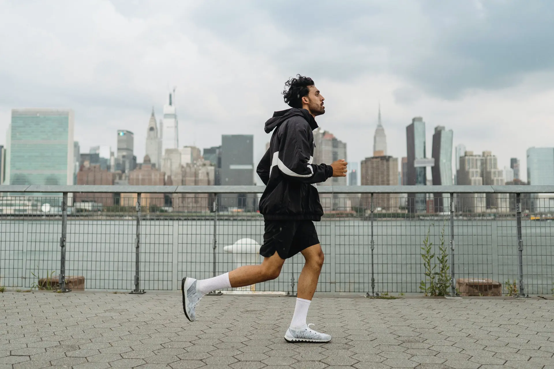 Man doing cardio in city