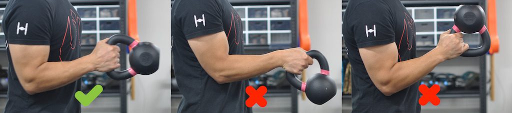 Gripping the kettlebell for hammer curls