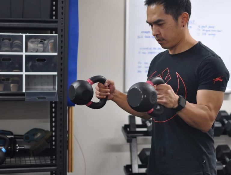 Mike doing kettlebell hammer curls