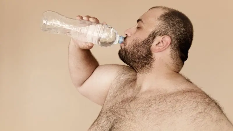 Big guy drinking water