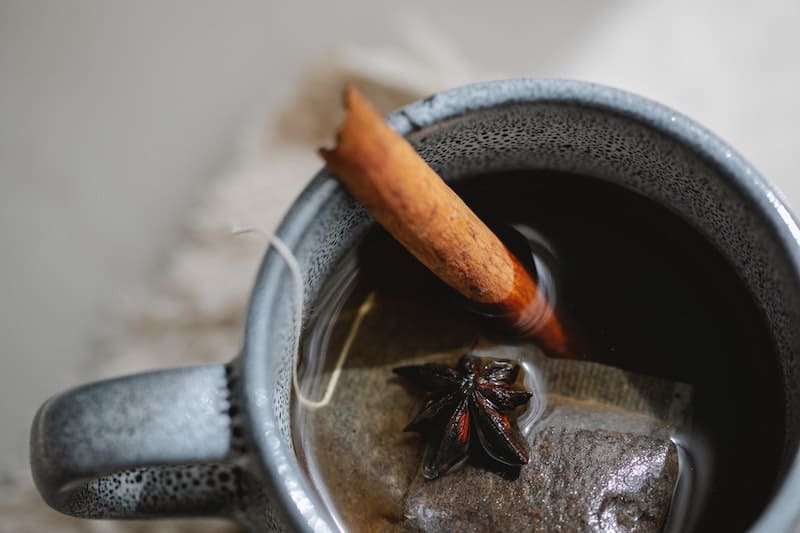 Close up inside cup of cinnamon tea