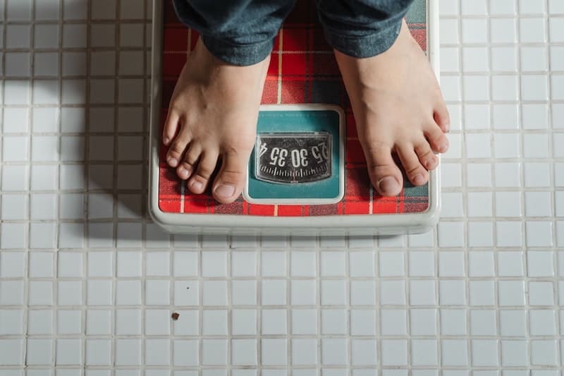 Person standing on scales