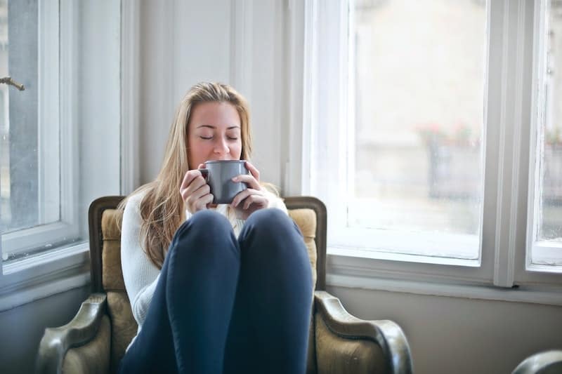 Woman drinking cinnamon tea