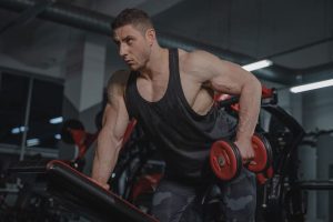 Man doing one-arm dumbbell rows