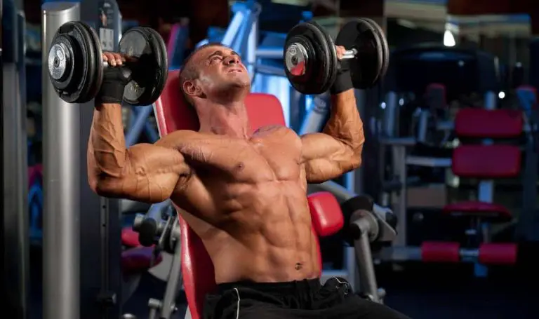 Man doing dumbbell shoulder press