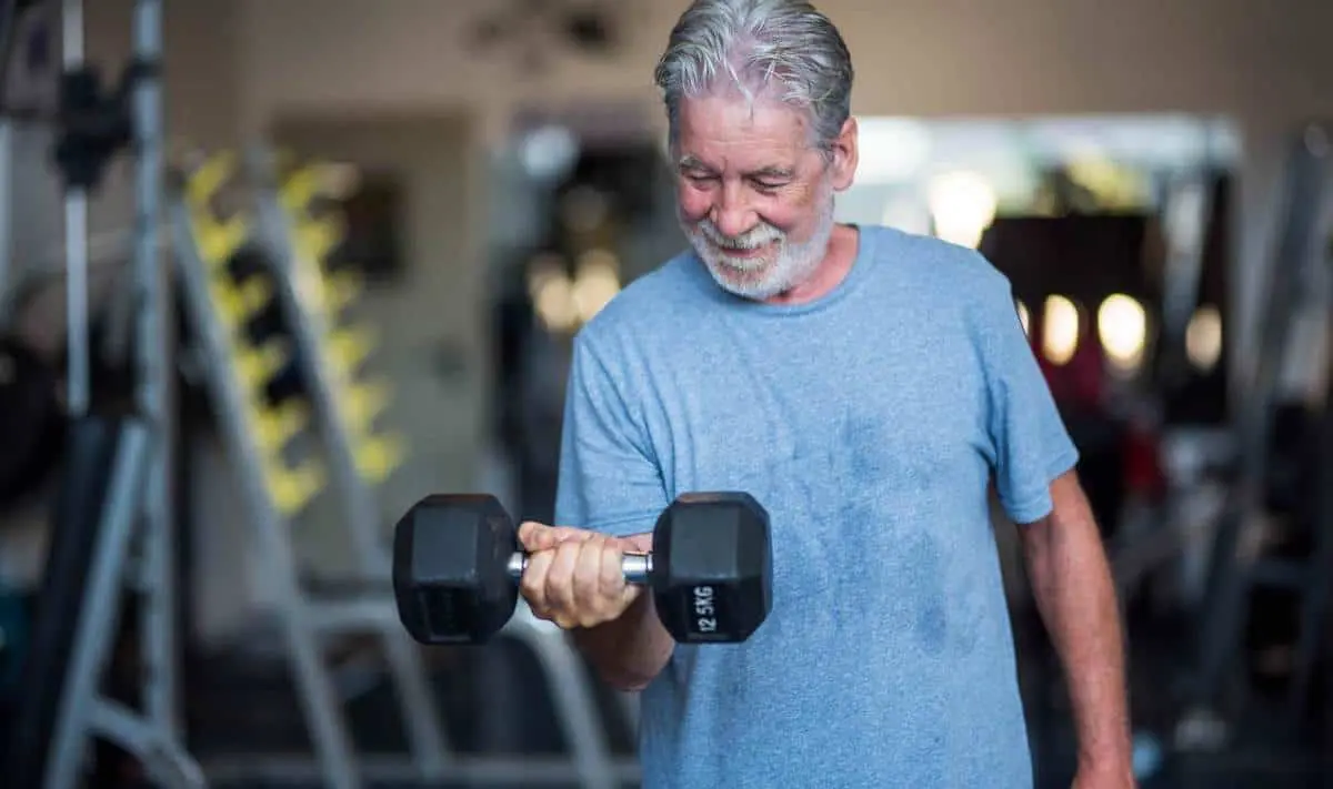 Man over 50 doing bicep curls