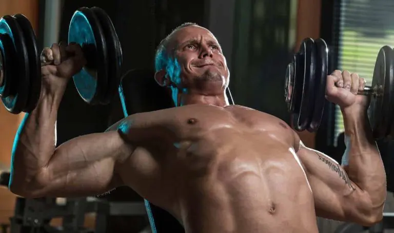 Man doing incline dumbbell chest presses