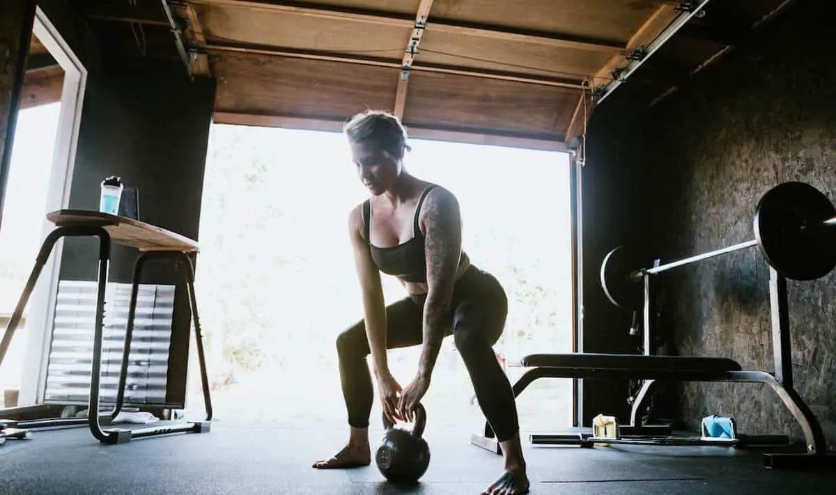 Woman doing deadlifts at home