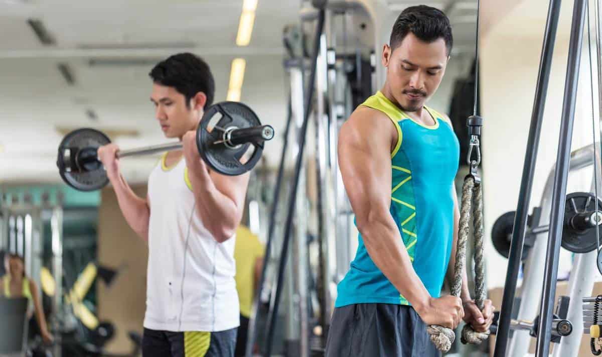 Two men working out at the gym